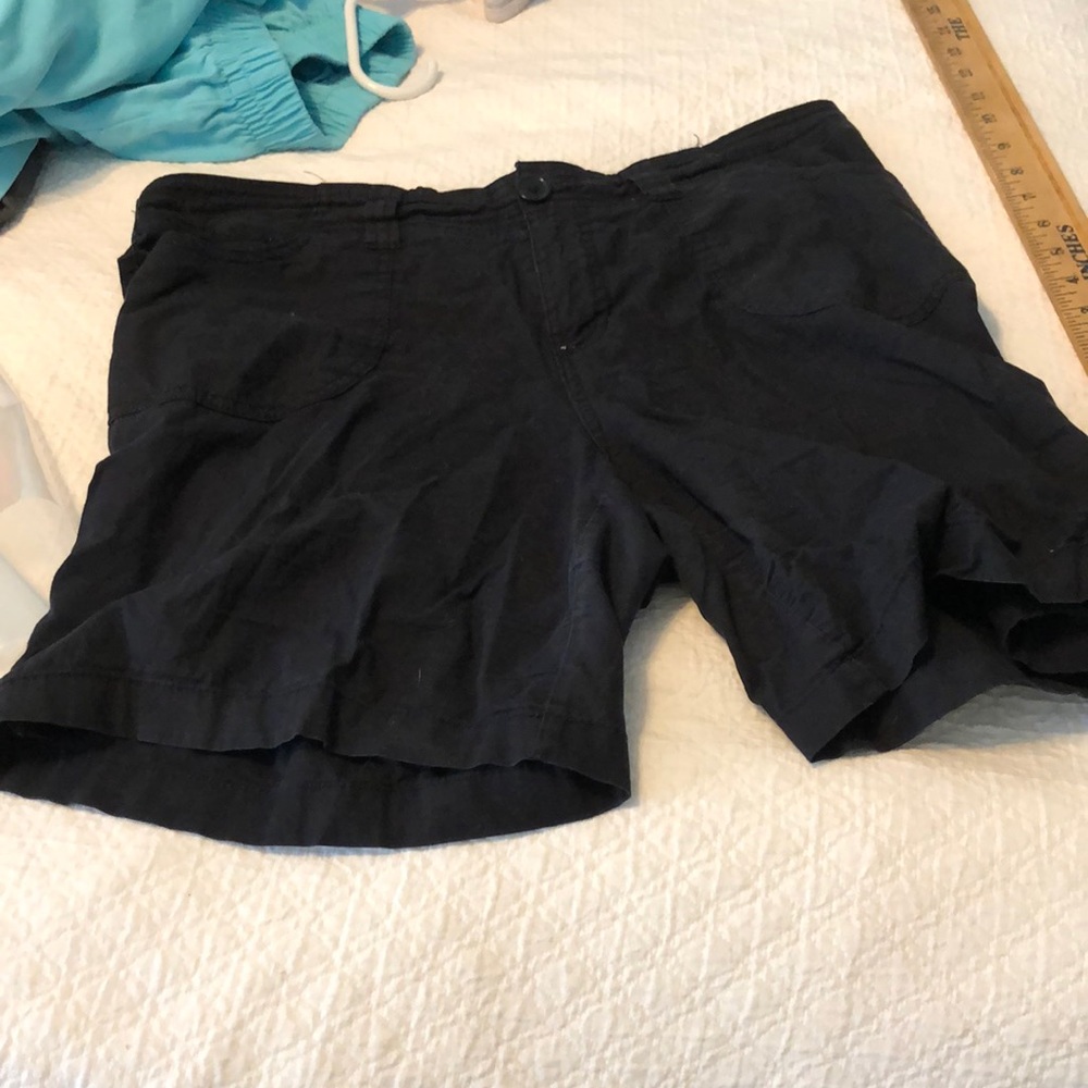 Mix company.    Black shorts.     Size L